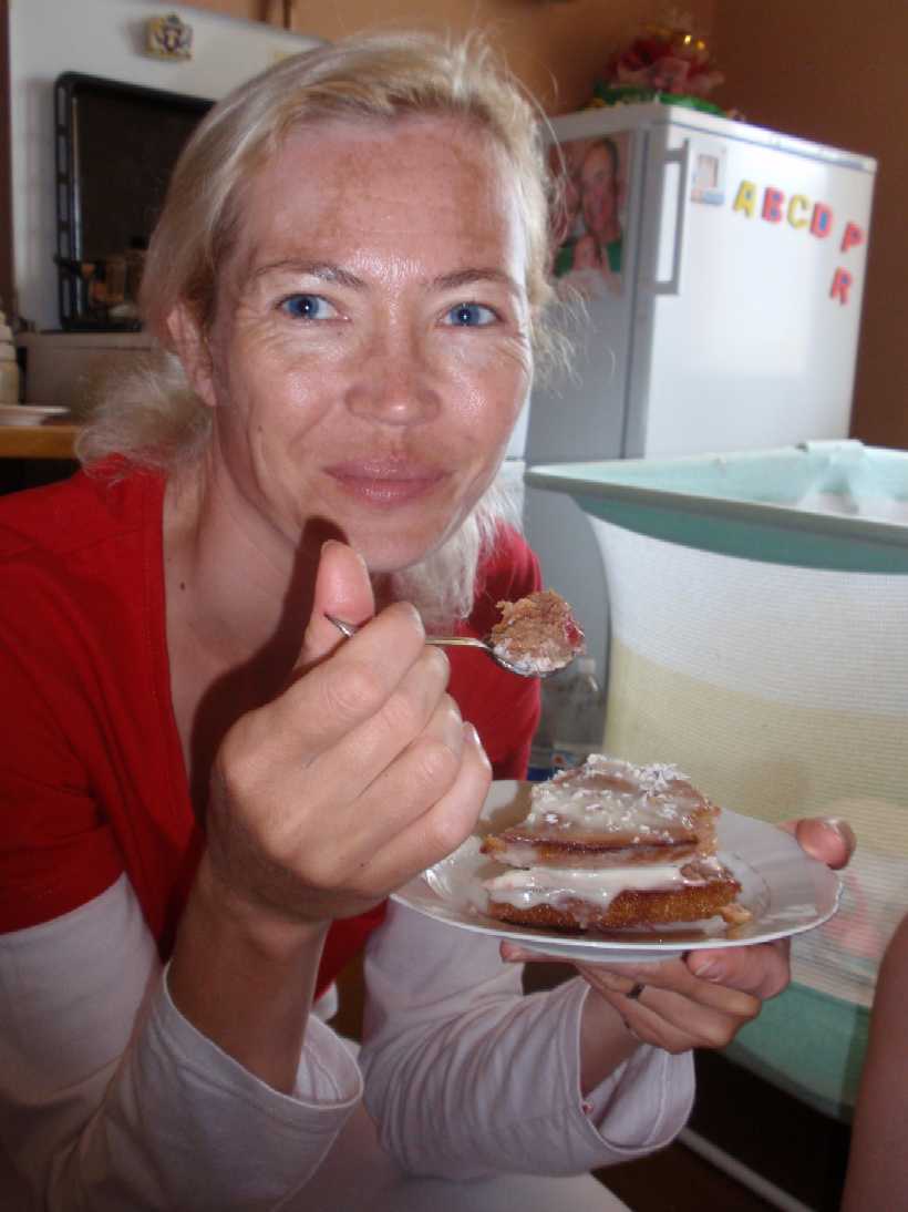 09  8 11  Deana eating delicious 'Tort' she baked for Robert's BD 820x1094  P8110079